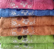 Текстиль в ассортименте - полотенца,  пледы,  постельное белье